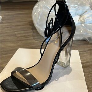 Elegant Black and Clear Heels